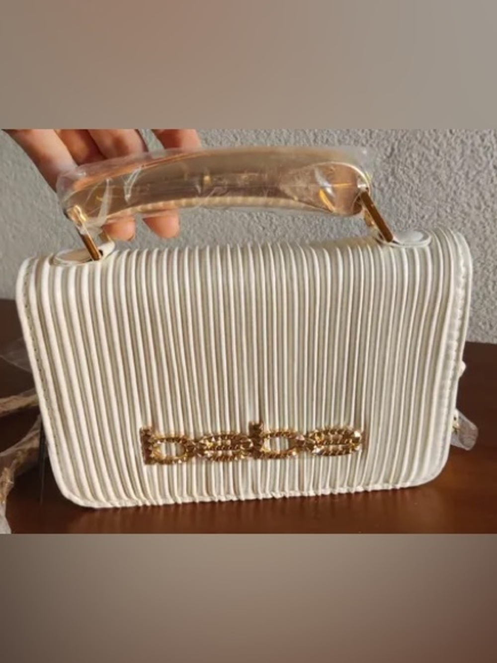 Bebe Elegant White Women's Handbag with Gold Chain Accent